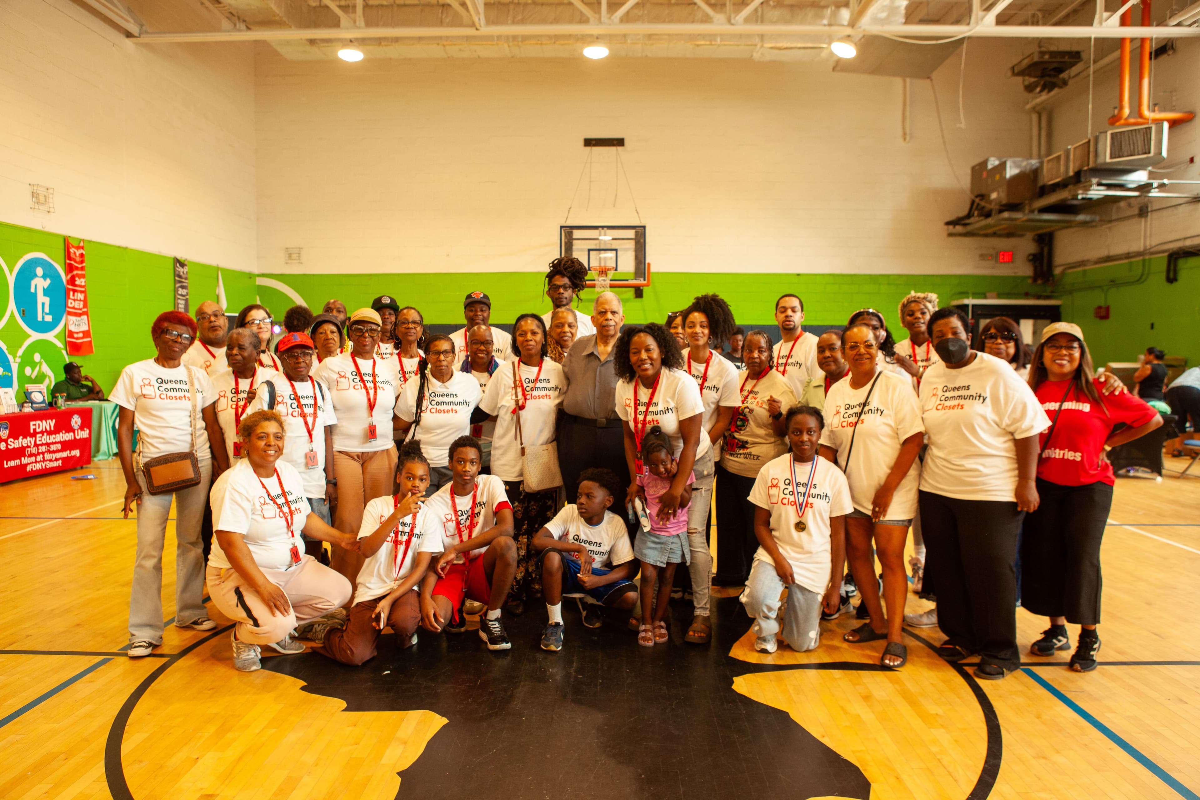 The coalition of volunteers, partners, and community members with State Senator Leroy Comrie at the Queens Community Closets Launch & Resource Fair, Roy Wilkins Recreation Center, St. Albans, Queens